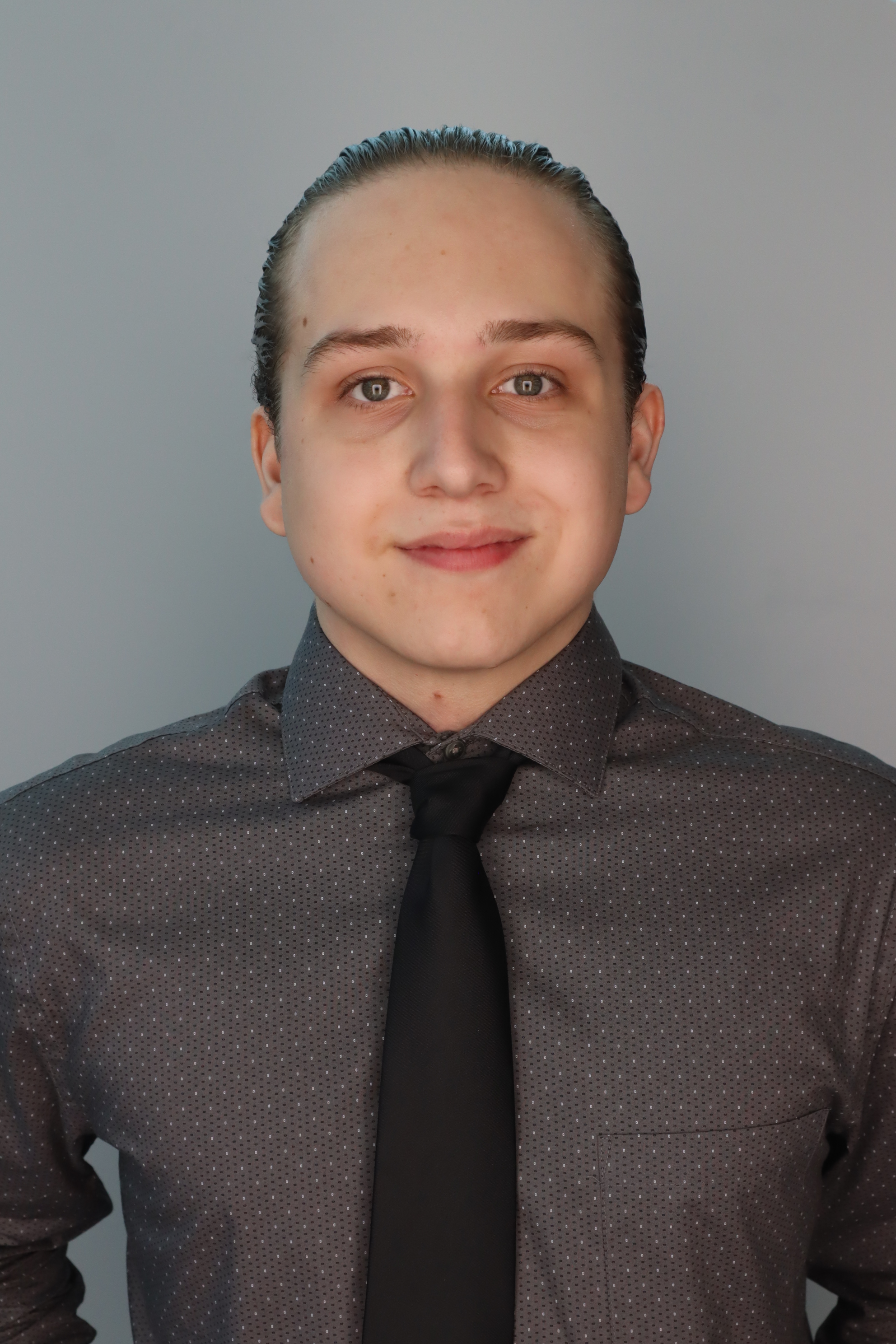 Headshot of Joey Gumulka